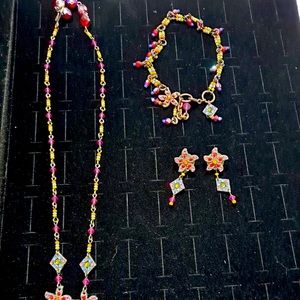 Beaded necklace, bracelet and earrings